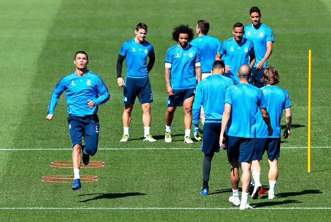 Real Madrid's Cristiano Ronaldo takes part in a drill during a training session at Valdebebas training ground in Madrid on Tuesday, ahead of the UEFA Champions League semi-final, second leg match against Manchester City