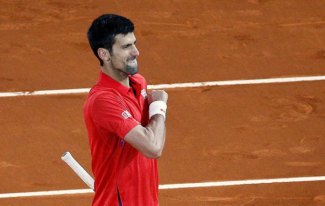 Serbia's Novak Djokovic celebrates after defeating Japan's Kei Nishikori at the Madrid Masters semi-final on Saturday