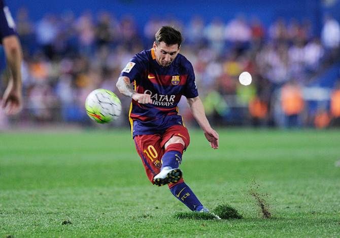 Lionel Messi takes a free-kick