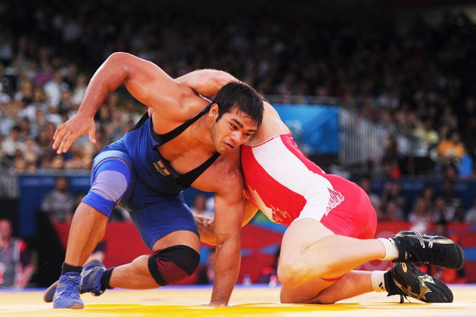 India's Narsingh Pancham Yadav competes in the Men's Freestyle 74 kg Wrestling at the London 2012 Olympic Games