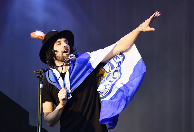 Sergio Pizzorno of Kasabian performs during the Leicester City Barclays Premier League winners bus parade