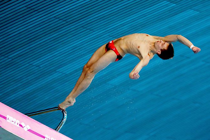 Viktor Minibaev of Russia competes in the Men's 10m Platform Final on May 15