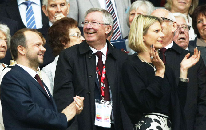 Former Manchester United manager Sir Alex Ferguson smiles after the club's FA Cup win over Crystal Palace at Wembley Stadium on Saturday