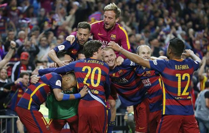 Barcelona players celebrate after winning the Copa del Rey final