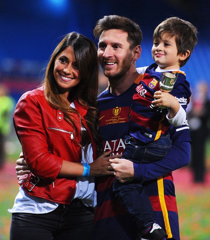 Barcelona's Lionel Messi celebrates with his wife Antonella Roccuzzo and son Thiago after winning the Copa del Rey final on Sunday
