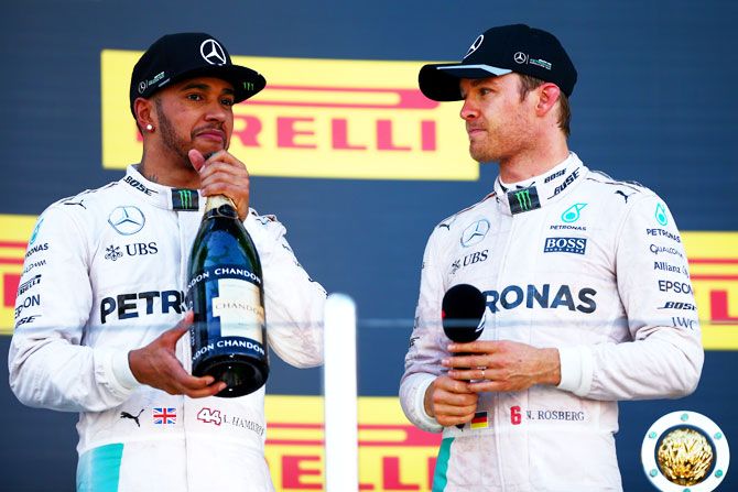 Mercedes GP teammates Nico Rosberg (right) and Lewis Hamilton