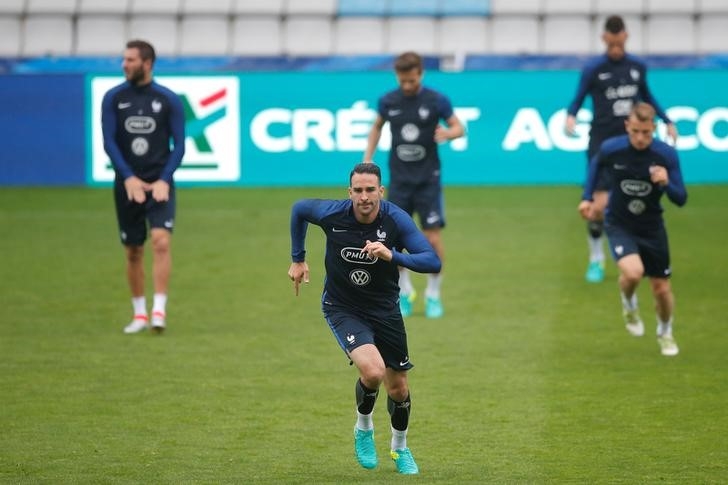 France's national soccer team player Adil Rami attends a training session 