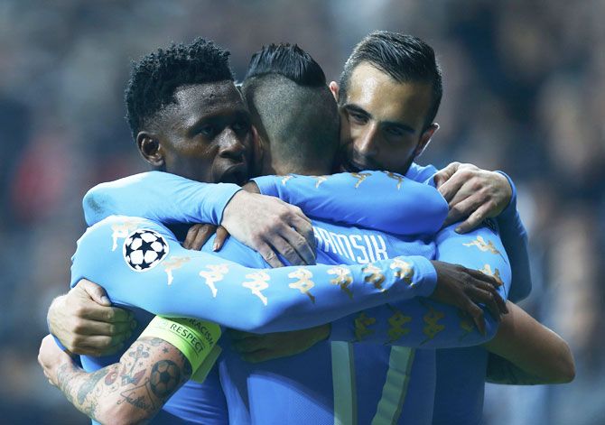 Napoli's Marek Hamsik celebrates with teammates after scoring a goal against Besiktas