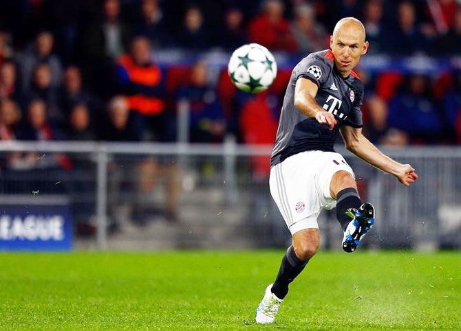 Bayern Munich's Arjen Robben takes a shot on goal