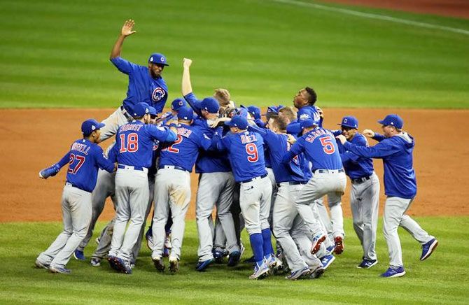 Chicago Cubs players celebrate after defeating the Cleveland Indians in game seven of the 2016 World Series at Progressive Field in Cleveland, Ohio on Wednesday