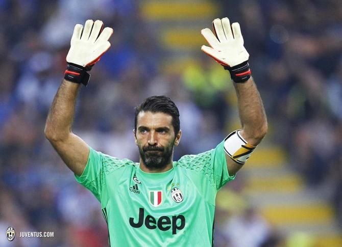 Gianluigi Buffon acknowledges the crowd as he comes on to play his 600th Serie A match on Sunday