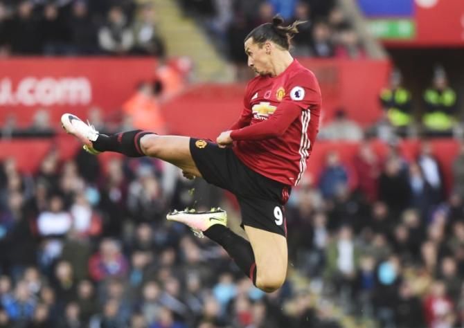Manchester United's Zlatan Ibrahimovic celebrates scoring their second goal against Swansea during their EPL match at Liberty Stadium on Sunday