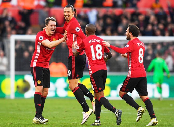 Manches United players celebrate a goal