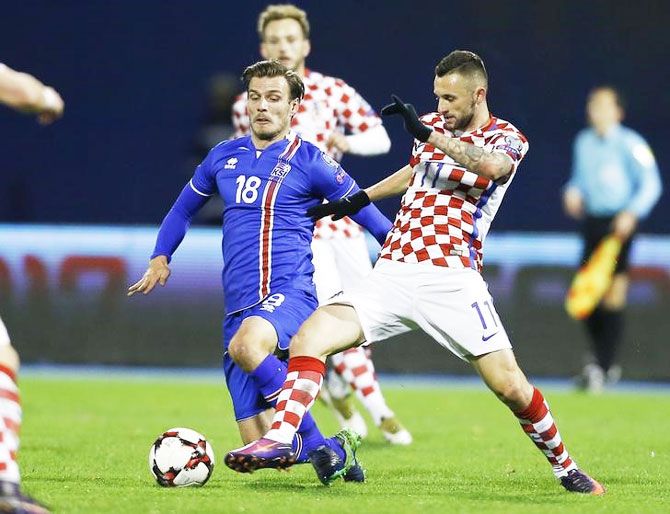 Croatia's Marcelo Brozovic challenges Iceland's Theodor Bjarnason during their World Cup qualifier in Zagreb on Sunday