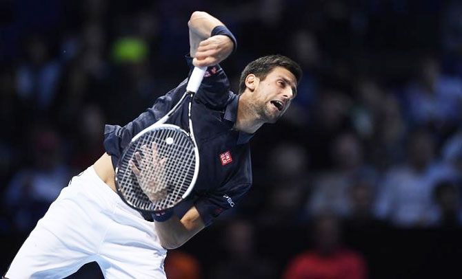 Serbia's Novak Djokovic in action against Austria's Dominic Thiem during their round-robin match at the ATP World Tour Finals at the O2 Arena in London on Sunday