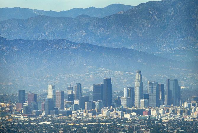 The city of Los Angeles, California is pictured on a hot summer day next to the San Gabriel mountains August 5, 2015