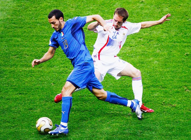 France's Frank Ribery challenges Italy's Gianluca Zambrotta during their 2006 FIFA World Cup match at the Olympic Stadium in Berlin, Germany, on July 9, 2006