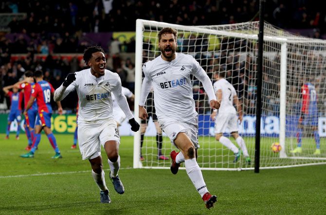 Swansea City's Fernando Llorente celebrates scoring his team's fifth goal during their Premier League match against Crystal Palace