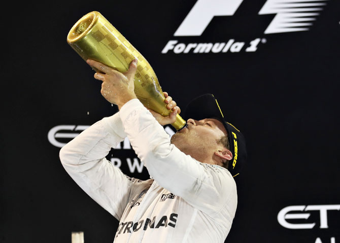 New F1 World Champion Nico Rosberg celebrates his win