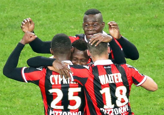 Nice's Jean Michel Seri (centre) celebrates after scoring a goal against Lyon during their Ligue 1 match at Allianz Riviera stadium in Nice, France on Saturday