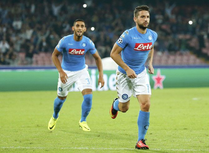 Napoli's Dries Mertens celebrates after scoring against Benfica during their Champions League Group B match at Sao Paolo stadium in Naples on September 28