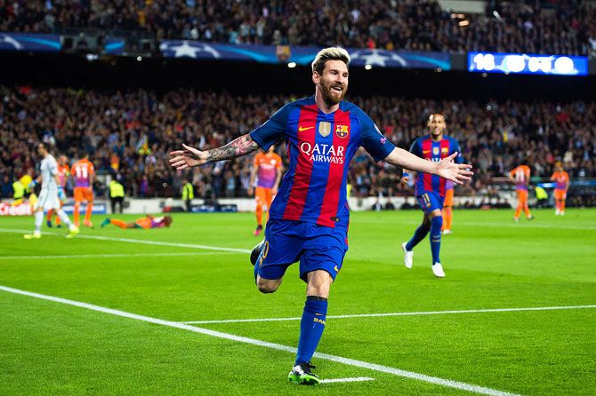 FC Barcelona's Lionel Messi celebrates after scoring the opening goal against Manchester City at Camp Nou during the UEFA Champions League group C match on Wednesday