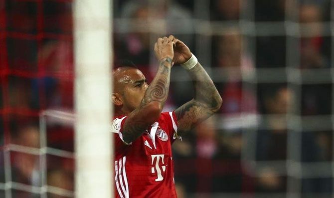 Bayern Munich's Arturo Vidal celebrates his goal against Borussia Moenchengladbach at the Allianz Arena in Munich on Sunday
