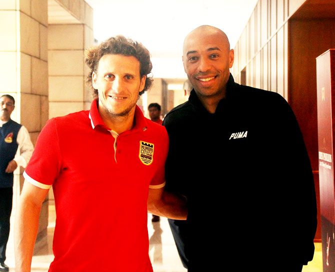 Uruguay legend and Mumbai City FC's Diego Forlan and French football legend Thierry Henry make for an epic picture before the Indian Super League match between Atletico de Kolkata and Mumbai City FC in Kolkata on Tuesday