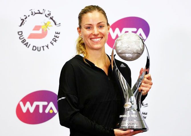  Angelique Kerber of Germany is presented her WTA Year-end Number One Trophy on the sidelines of the round robin matches at the WTA Finals in Singapore 