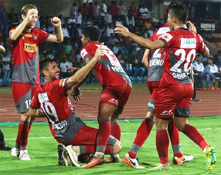 Atletico de Kolkata players celebrate with winning goal with Belencoso  during their ISL match against NorthEast United in Guwahati on Friday
