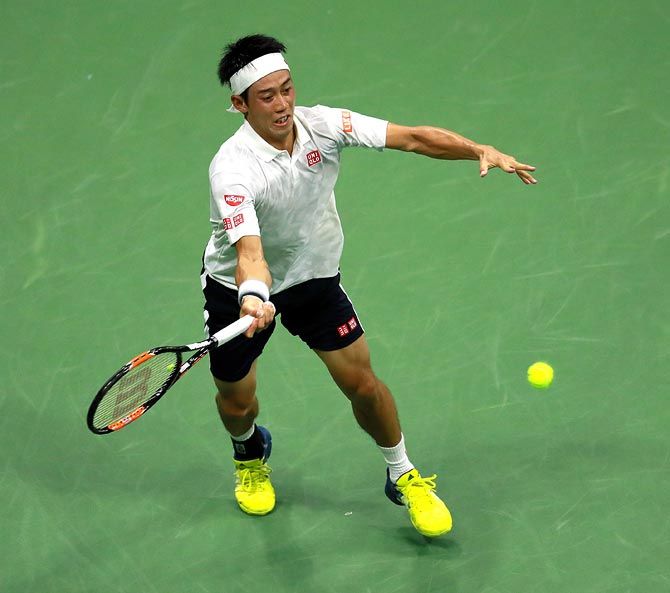 Kei Nishikori returns a shot during the semi-final match against Stan Wawrinka on Day 12 of the 2016 US Open