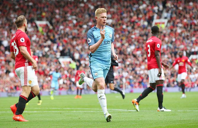 Manchester City's Kevin De Bruyne celebrates scoring his side's first goal against Manchester United during their Premier League match at Old Trafford on Saturday