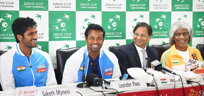 India's Leander Paes, Saketh Myneni, and captain Anand Amritraj (right) along with SpiceJet CMD Ajay Singh speak at a press conference in New Delhi on Tuesday ahead of the Davis Cup tie against Spain