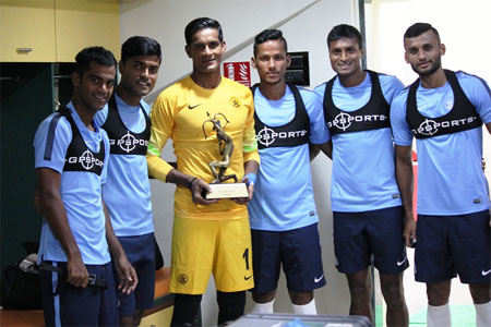 India goalkeeper Subrata Paul (centre) stands with teammates as he shows off his Arjuna Award