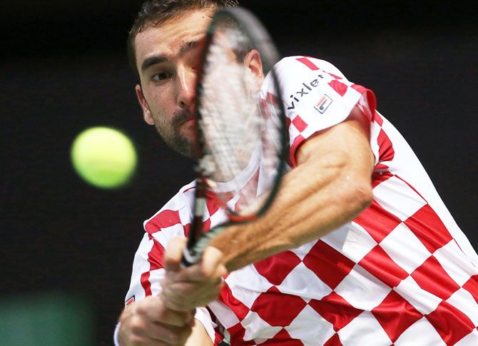 Croatia's Marin Cilic in action during his singles match against France's Lucas Pouille