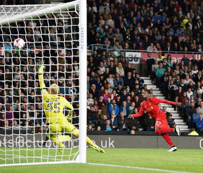 Liverpool's Divock Origi nets one past Derby County 'keeper Jonathan Mitchell