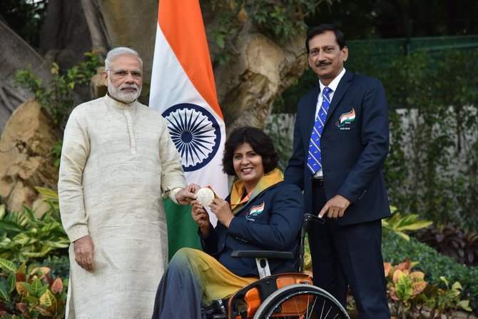 Prime Minister Narendra Modi with silver medal winner Deepa Malik