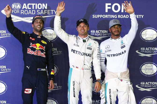 Mercedes' Nico Rosberg and Lewis Hamilton with Red Bull's Daniel Ricciardo