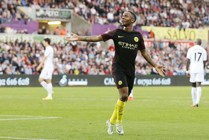Manchester City's Raheem Sterling celebrates scoring against Swansea during their EPL match on Saturday
