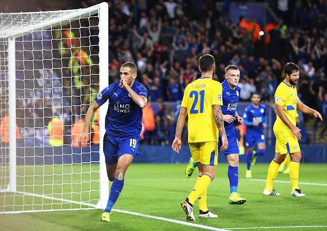 Leicester City's Islam Slimani (19) celebrates as he scores their first goal against FC Porto during their Champions League match at The King Power Stadium in Leicester on Tuesday