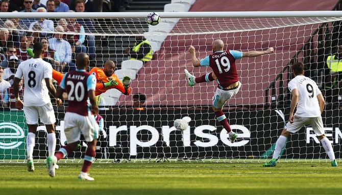 West Ham United's Darren Randolph and James Collins in action during their EPL match against Swansea City at London Stadium on Saturday