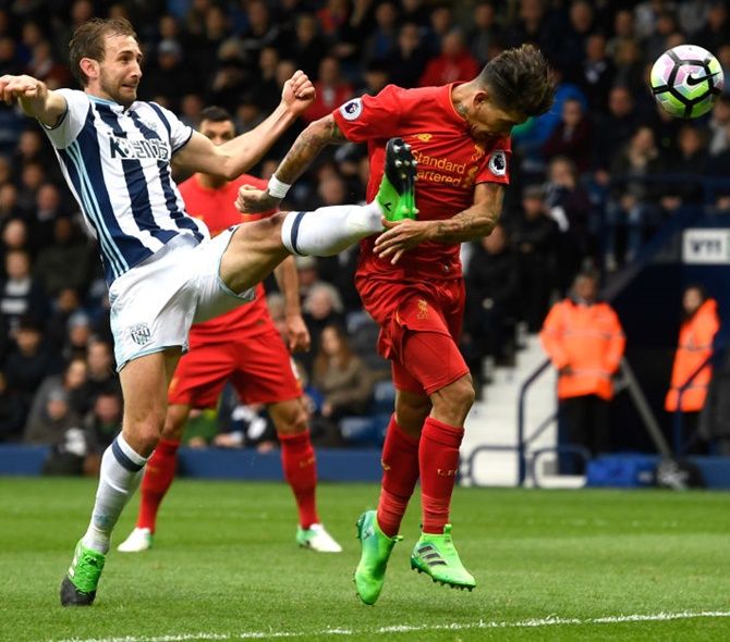 Roberto Firmino of Liverpool scores his side’s first goal during the Premier League match against West Bromwich Albion