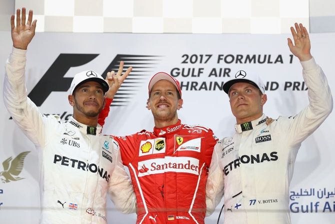 Ferrari's Sebastian Vettel celebrates