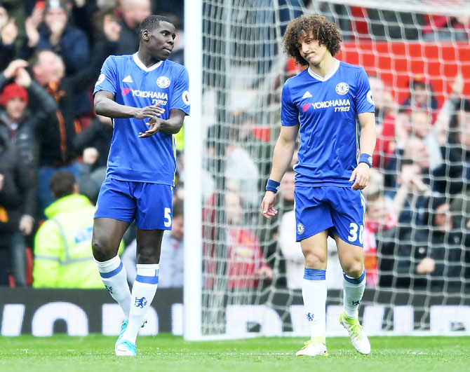 Chelsea's Kurt Zouma and David Luiz are dejected after Manchester United's Marcus Rashford nets a goal during their English Premier League match at Old Trafford in Manchester on Sunday