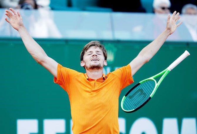 Belgian David Goffin celebrates after defeating Novak Djokovic during the Monte Carlo Masters in Monte Carlo, Monaco, on Friday