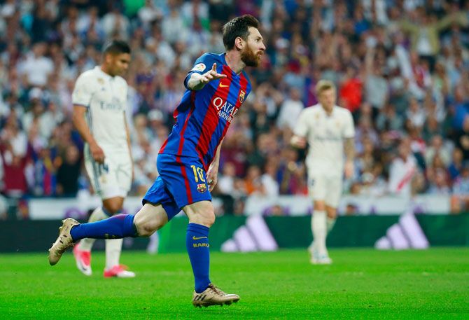 Barcelona's Lionel Messi celebrates on scoring against Real Madrid during their Clasico encounter at the Santiago Bernabeu in Madrid on Sunday