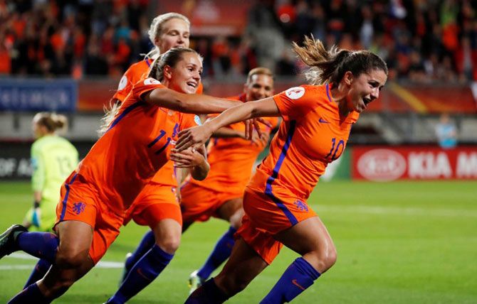 Netherlands’ Danielle van de Donk celebrates scoring their second goal with teammates during their Euro semi-final on Thursday