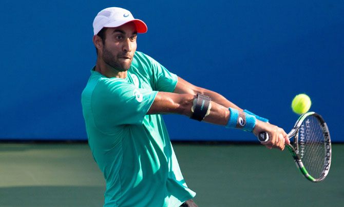India's Yuki Bhambri plays a return against USA's Kevin Anderson during the Citi Open at William H.G. FitzGerald Tennis Center in Washington DC on Friday