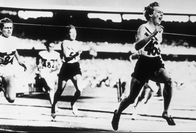 Betty Cuthbert of Australia wins the 200m beating Christa Stubnik of Germany (silver) and Marlene Mathews of Australia ( bronze) during the 1956 Olympic Games in Melbourne, Australia