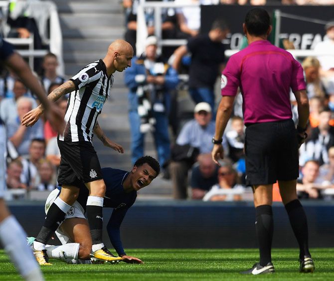 Tottenham Hotspur's Dele Alli reacts leading to a red card for Newcastle United's Jonjo Shelvey